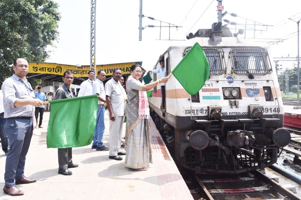 Member of Parliament (Lok Sabha), Queen Oja flags off the Guwahati-Barmer-Guwahati weekly express, with newly converted modern Linke Hofmann Busch coaches on from Guwahati Railway Station on August 31. (Photo Courtesy: NFR)